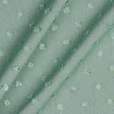 Viscose dobby textured spot polkadot dress fabric. Sage green and white